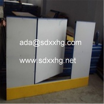 hockey dasher board frame with a plastic handrail a baffle plate